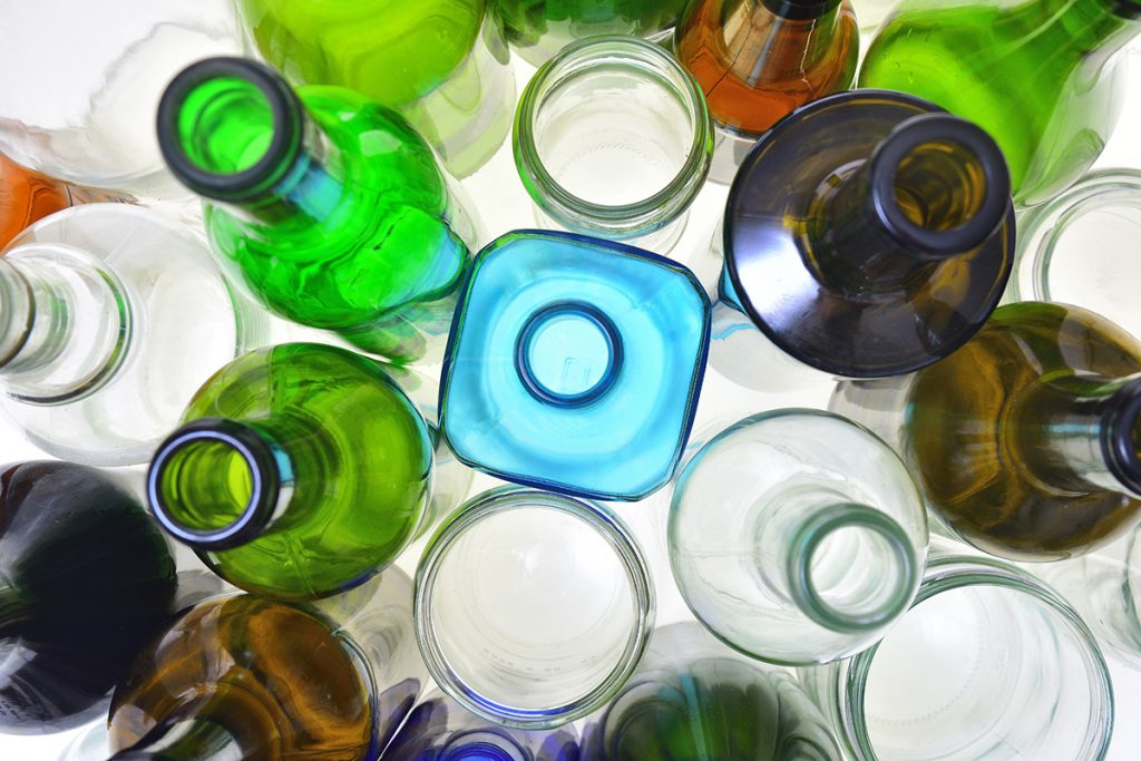 Glass containers gathered for recycling.
