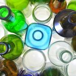 Glass containers gathered for recycling.