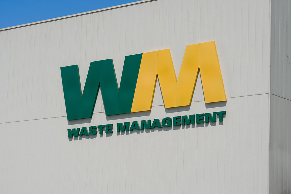 Waste Management company logo on building.