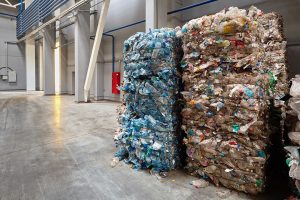 Bales of plastics in a recycling facility.