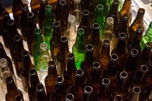 Glass bottles gathered for recycling.