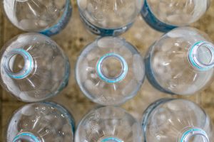 Closeup of several empty water bottles.