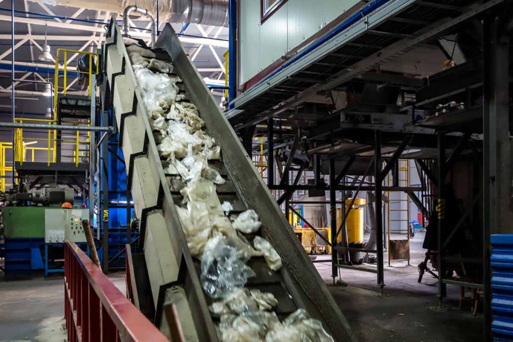 Materials on a conveyor at a MRF.