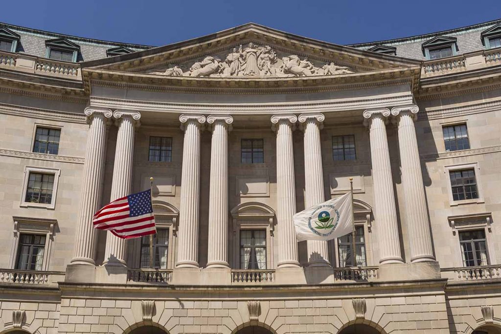 U.S. EPA building with flags for the agency and the U.S.
