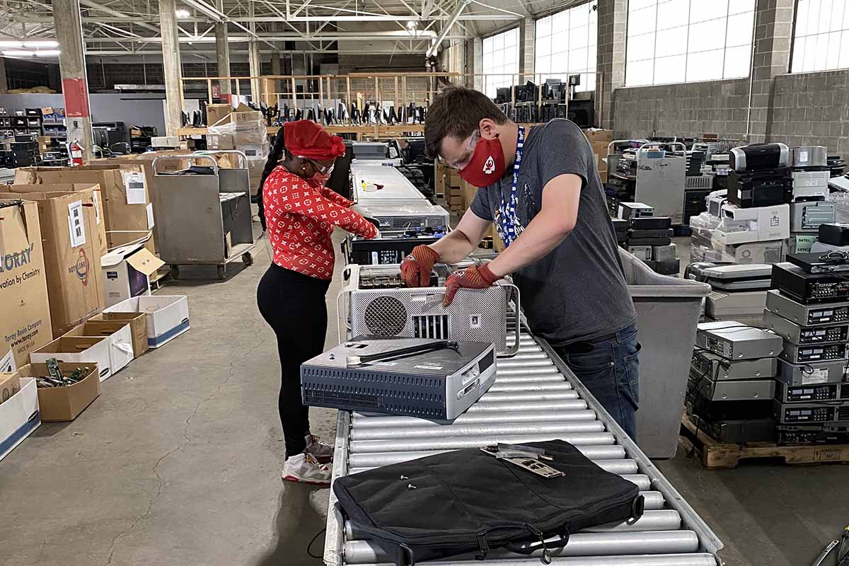 Workers at PCs For The People facility.