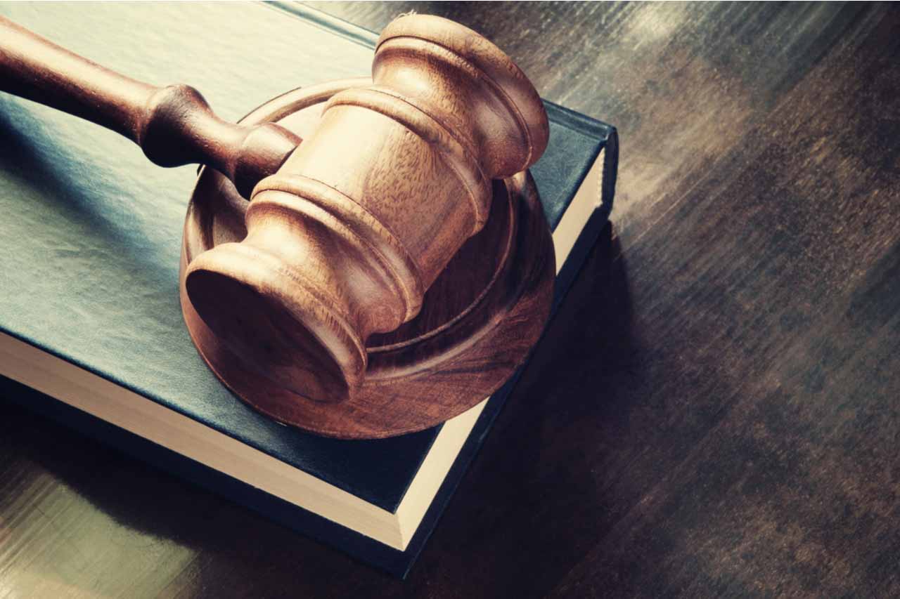 Court gavel on a book.