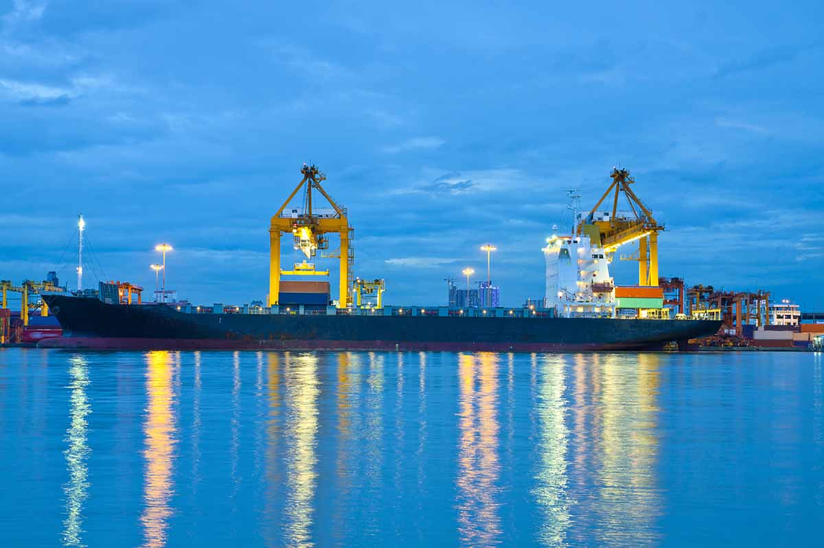 Export shipping terminal scene on the water.