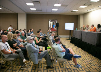 Attendees listen to speakers at the 2022 E-Scrap Conference.