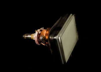 Old television CRT isolated on black background.