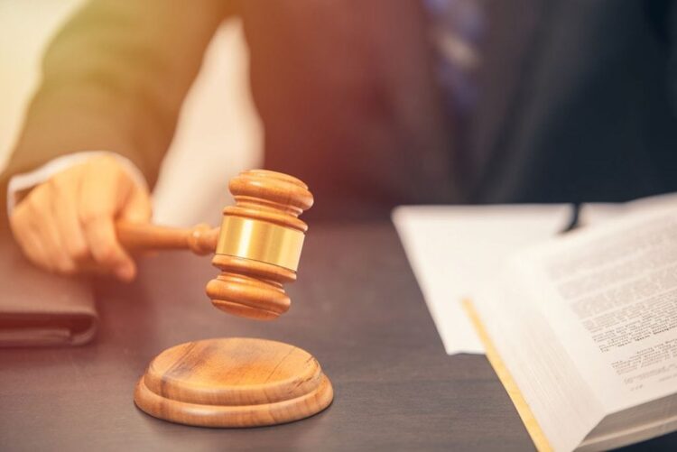 Plaintiff in processor lawsuit now facing criminal charges