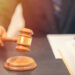 Judge holding a gavel.