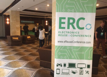 Sign for the Electronics Reuse Conference in hotel lobby.