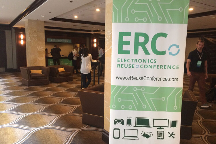 Sign for the Electronics Reuse Conference in hotel lobby.