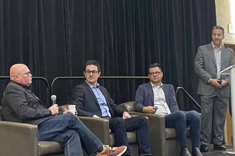 Speakers at a panel at the 2022 E-Reuse Conference.