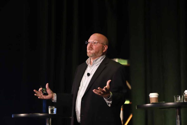 Bo Bodo of LI-Cycle speaks on stage at the 2022 E-Scrap Conference.