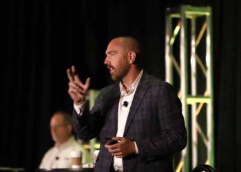 Bo Bodo of Li-Cycle speaks on stage at the 2022 E-Scrap Conference.