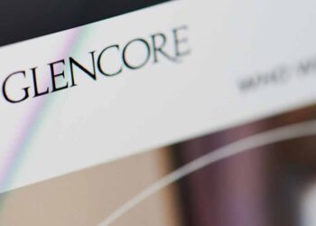 Glencore logo on screen.