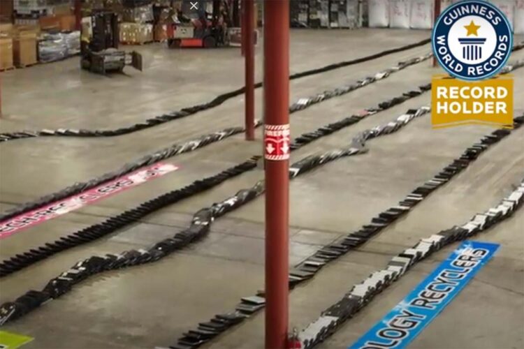 View of laptops fallen like dominos at Technology Recyclers facility.