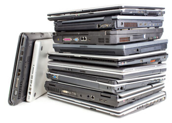 A stack of laptop computers.