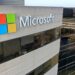 Microsoft company logo on building.