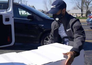 Students receive devices from Mission Ignite to help bridge the digital divide.