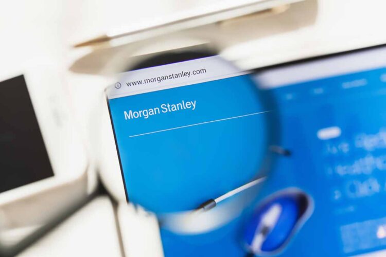 Morgan Stanley company logo on screen under magnifying glass.