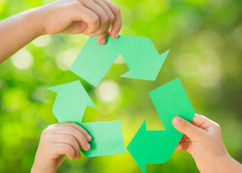 Recycling Symbol With Hands