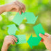 Recycling Symbol With Hands