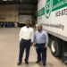S3 company CEO and Chairman stand by a company truck.