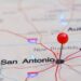 Map showing a pin in San Antonio and surrounding area blurred.
