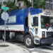 Waste Connections company truck on an urban street.
