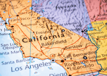 SB 54 draft rules generate debate on rates, review