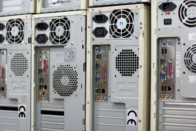 Computer towers gathered for recycling.