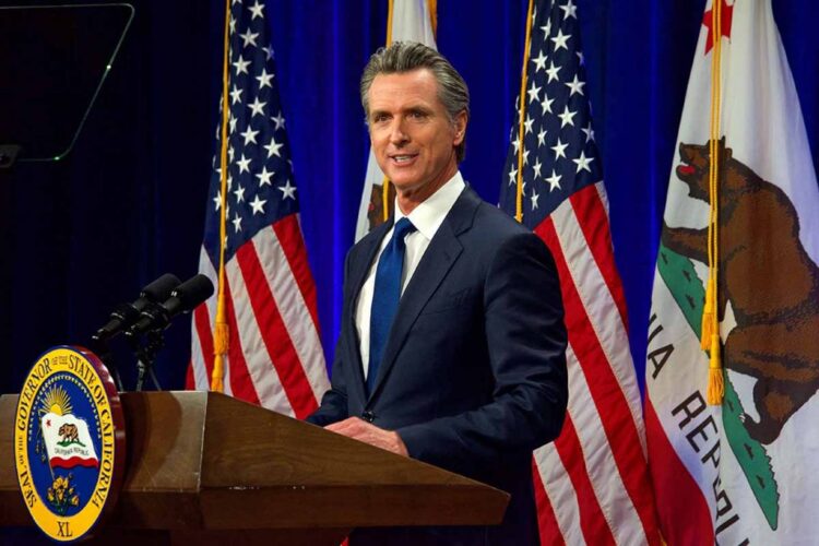 Calif. Governor Gavin Newsom at podium.