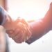 Business people shaking hands.