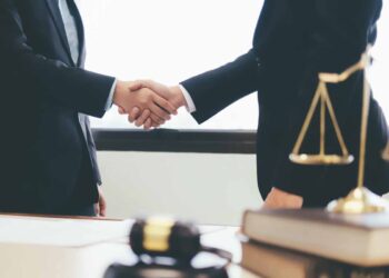 Legal scene, handshake.