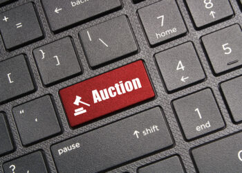 Keyboard with an auction button.