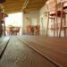 Closeup of Trex composite flooring installed in a restaurant.