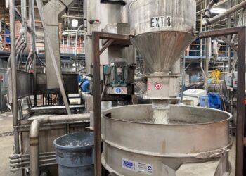 Extruder pushes out natural HDPE pellets at KW Plastics in Troy, Alabama.
