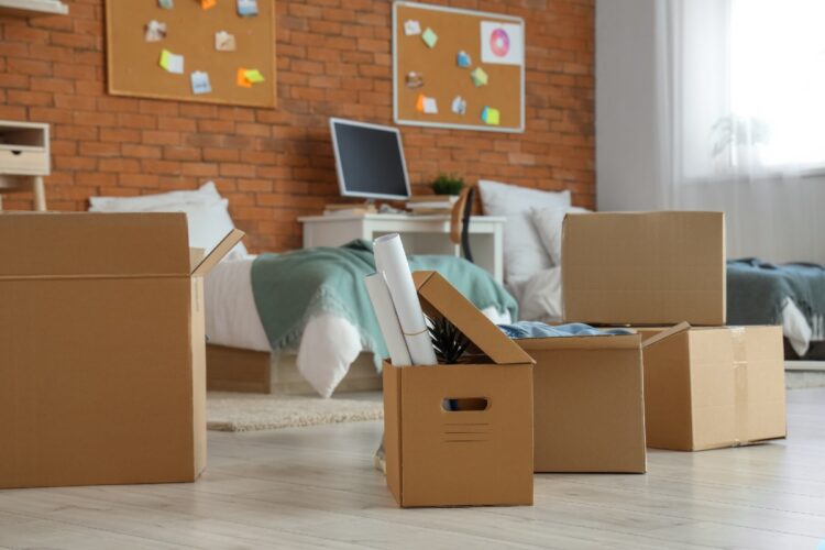 College dorm room with boxes from moving day
