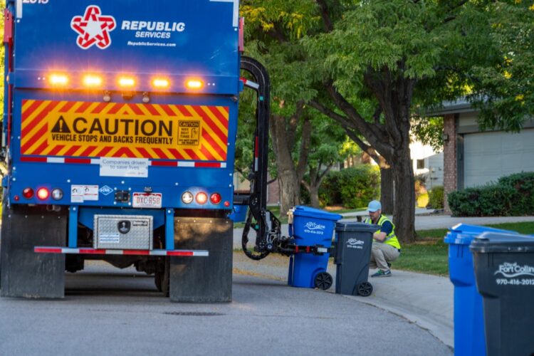 A Republic Services truck picks up a recycling cart in Fort Collins, Colorado.