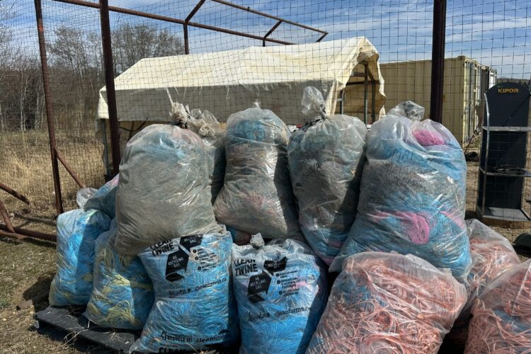 Bags of collected agricultural twine for Cleanfarms twine recycling contest