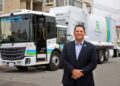 Recology CEO Sal Coniglio in front of one of the hauler's trucks